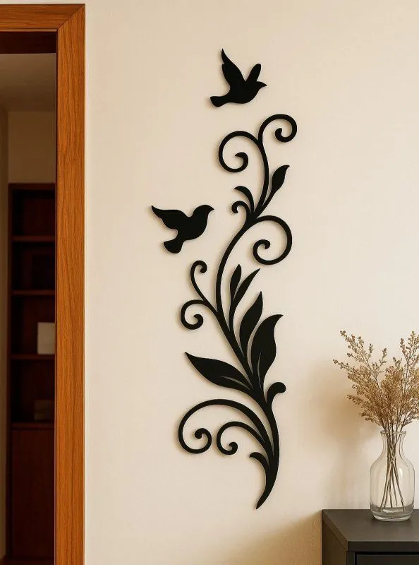 Laser-cut bird and flowering vine decor